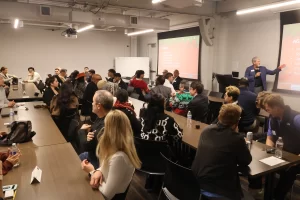 NETWORK UP members seated at a monthly networking meeting
